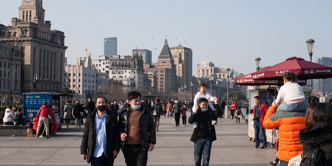 Tourists visit the Bund during the Lunar New Year holiday in east China's Shanghai, Feb. 16, 2021. Photo:VCG