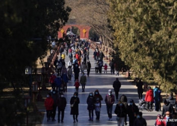 People visit Tiantan (Temple of Heaven) Park in Beijing, capital of China, Feb. 17, 2021. (Xinhua/Ju Huanzong)