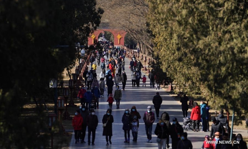 People visit Tiantan (Temple of Heaven) Park in Beijing, capital of China, Feb. 17, 2021. (Xinhua/Ju Huanzong)