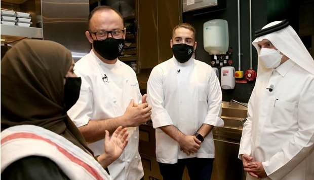 Qatar Airways Group Chief Executive HE Akbar al-Baker interacting with a group of chefs. Qatar Airwa