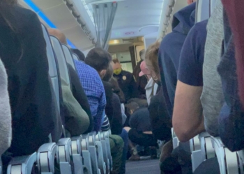 An American Airlines flight attendant hit an unruly passenger in - Travel News, Insights & Resources.