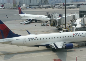 Delta Air Lines drops surcharge for unvaccinated employees - Travel News, Insights & Resources.