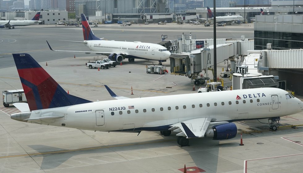 Delta Air Lines drops surcharge for unvaccinated employees - Travel News, Insights & Resources.