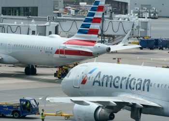 American Airlines says it will report a pretax profit for - Travel News, Insights & Resources.