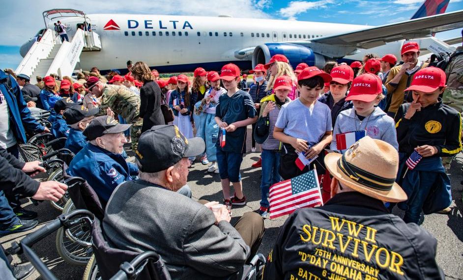 Delta connects generations cultures with WWII veterans charter to Normandy - Travel News, Insights & Resources.