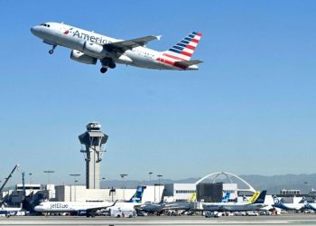 Family flying American Airlines claims they were asked to pay - Travel News, Insights & Resources.