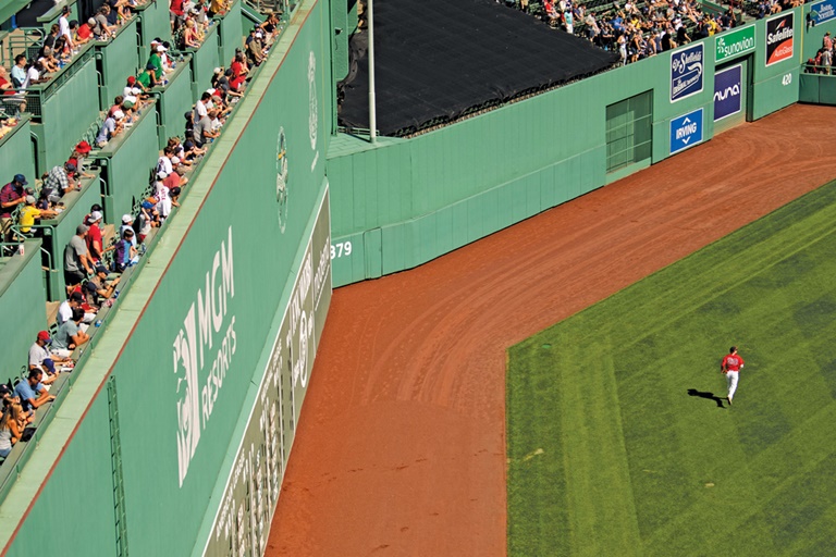 pg 30 Closing Shot Fenway Park Green Monster seats Getty - Travel News, Insights & Resources.