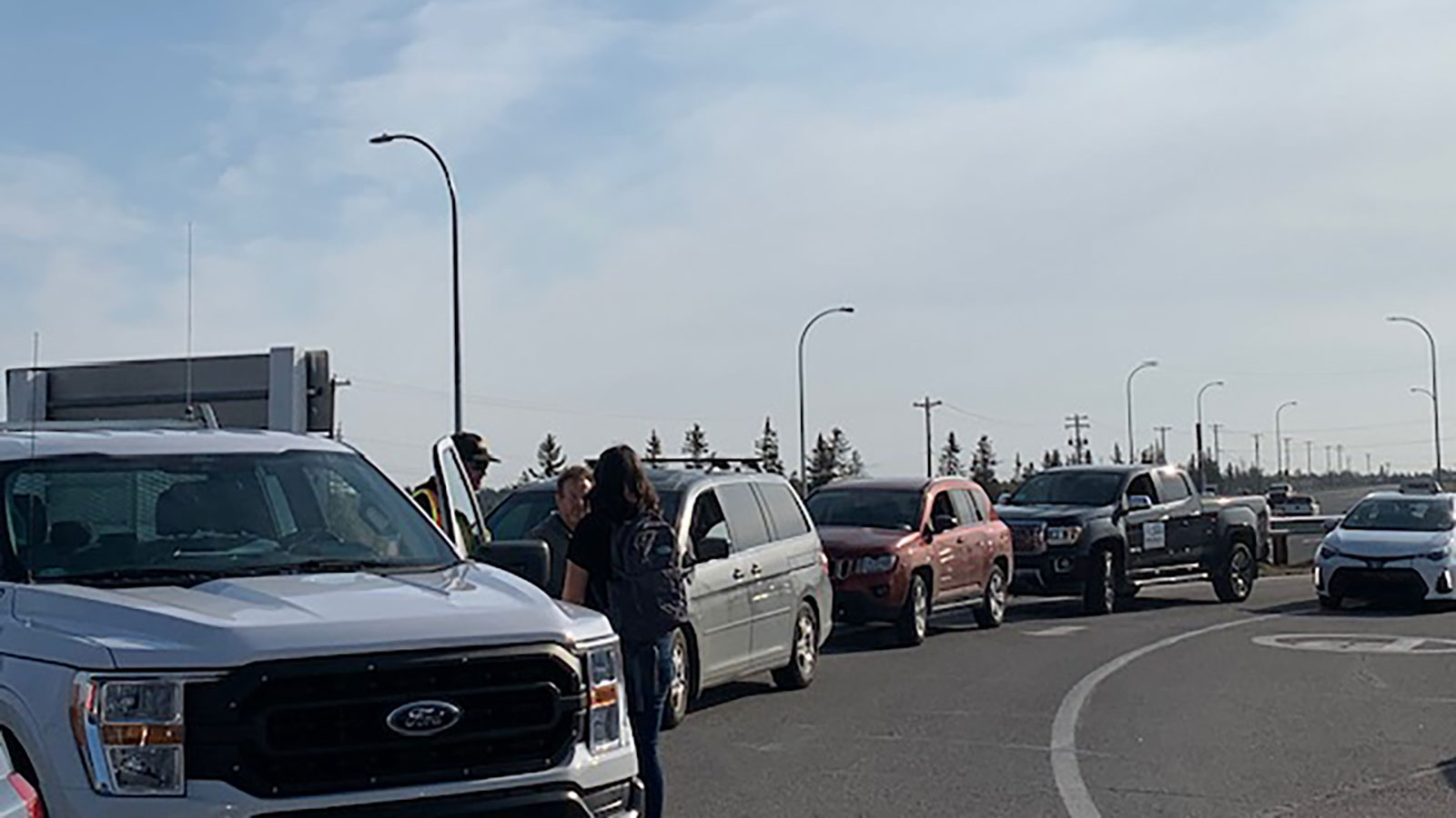 Cars wait to collect passengers at Yellowknife Airport on September 6, 2023. Photo: Cathy Downes