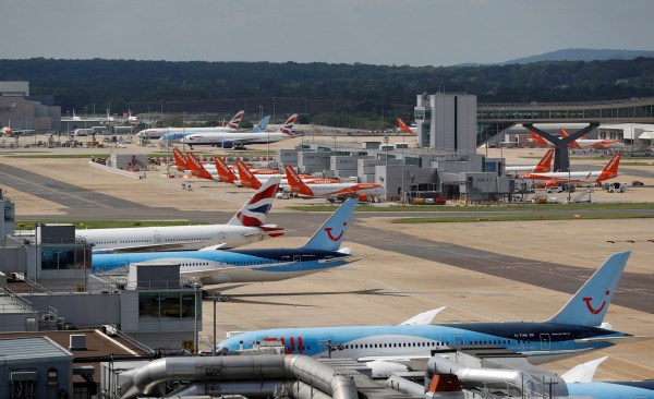 FILE PHOTO: British Airways, Easyjet and TUI aircraft are parked at the South Terminal at Gatwick Airport, in Crawley, Britain, August 25, 2021. REUTERS/Peter Nicholls/File Photo