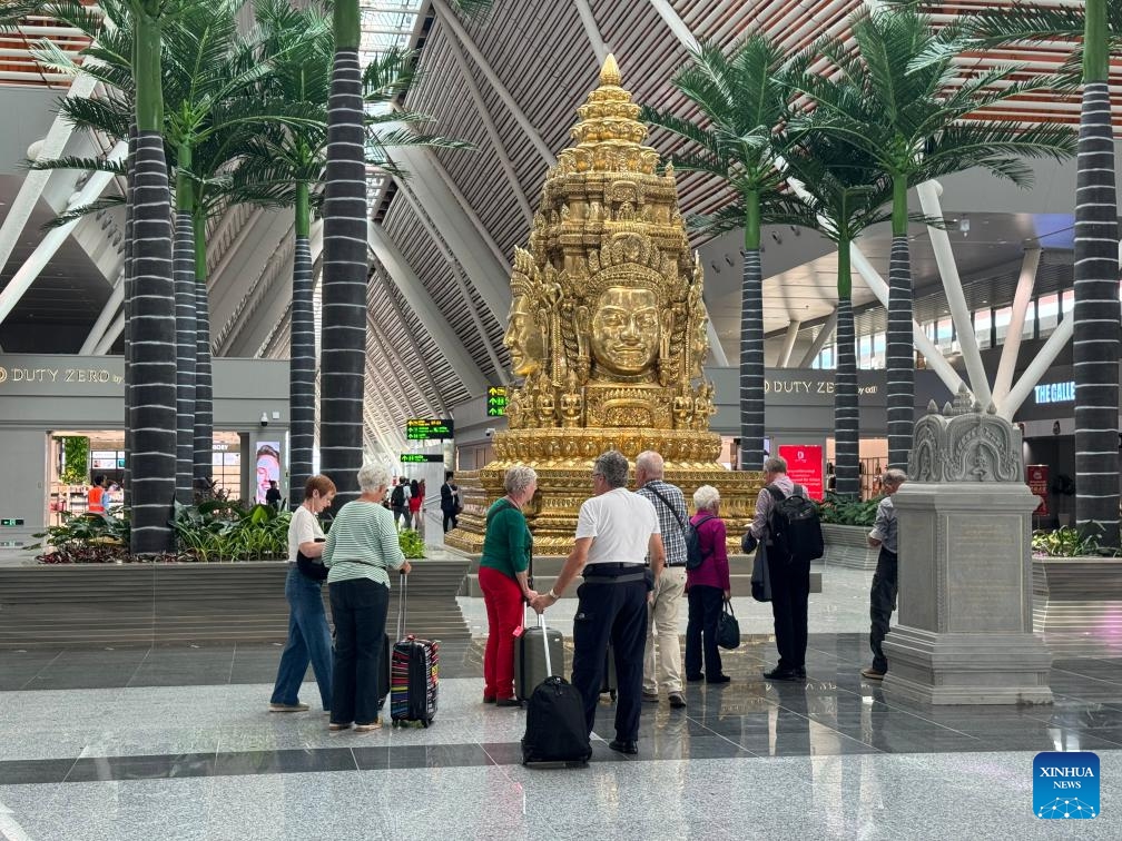 Passengers wait for their flights at the Siem Reap Angkor International Airport (SAI) in Siem Reap province, Cambodia, Nov. 16, 2023. Chinese-invested Siem Reap Angkor International Airport (SAI) in northwest Cambodia's Siem Reap province was officially inaugurated on Thursday, raising hope for the recovery of the kingdom's tourism industry.(Photo: Xinhua)