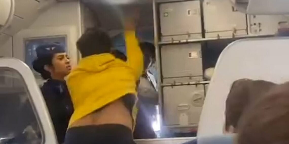 Moment air passenger stuck in 13 hour delay flips and SLAPS - Travel News, Insights & Resources.