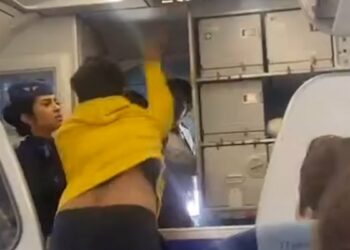 Moment air passenger stuck in 13 hour delay flips and SLAPS - Travel News, Insights & Resources.