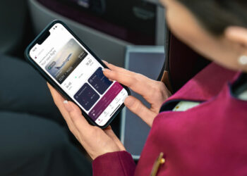 Qatar Airways Equips Cabin Crew with Smartphones for Tailored Passenger - Travel News, Insights & Resources.