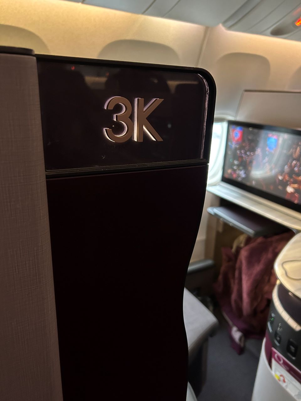 Qatar Airways B777 QSuite view from seat outside - Travel News, Insights & Resources.