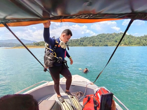 Rescue teams are searching for a British tourist who fell into the water while kayaking at a dam in Thailand. Shanghaman Gowribalan, 24, was kayaking with his friend at the Rajjaprabha Dam in Surat Thani province at around 9 am on Sunday afternoon, February 11. However, the Brit, reportedly fell into the deepest part of the reservoir, around 500 metres away from the Kraisorn Raft House, and could not swim to safety.??????PACKAGE: Video, pictures, text