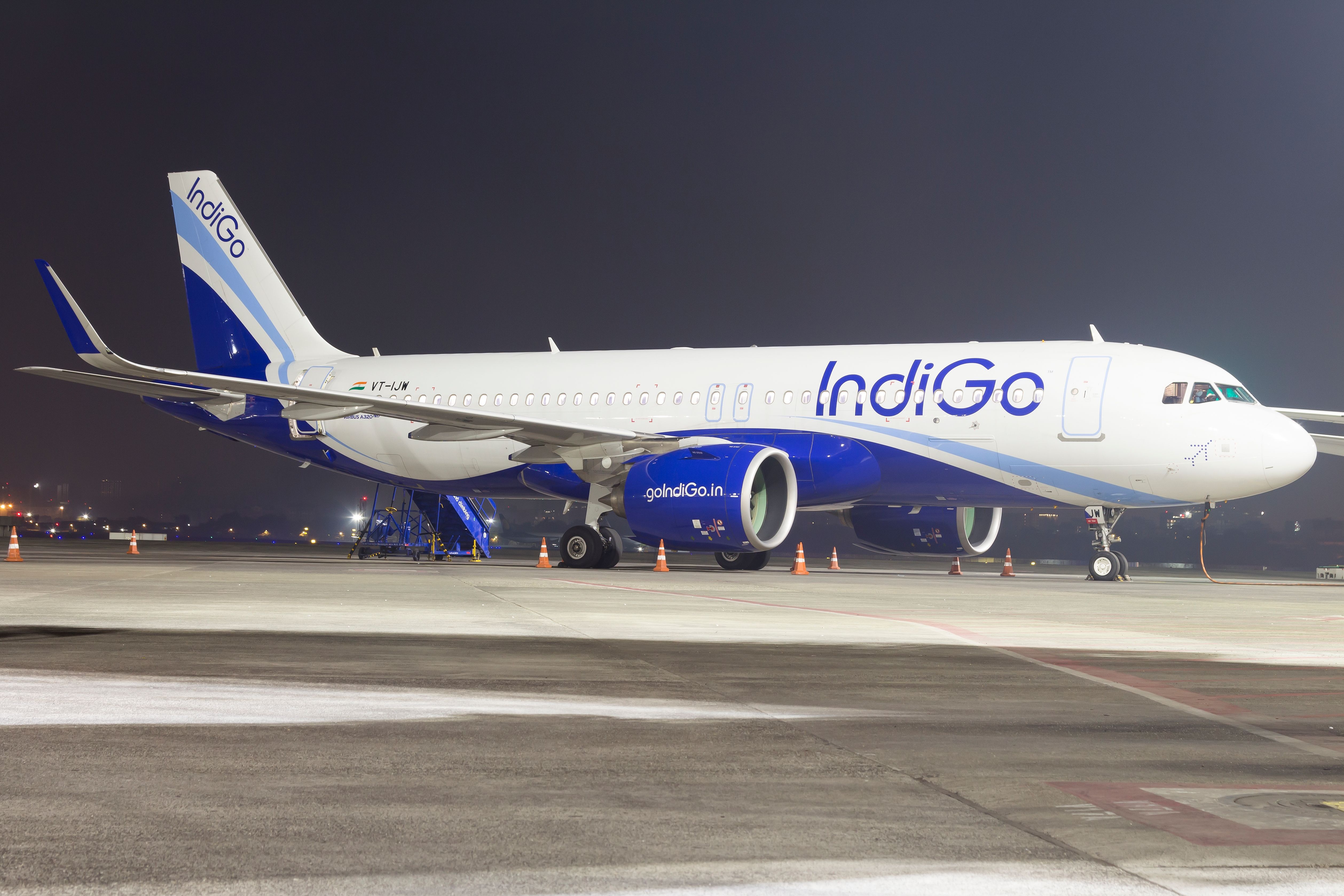 IndiGo Airlines' Airbus A320neo resting on the ramp of Mumbai Airport.