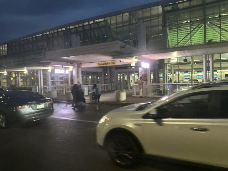 cars parked outside of a building