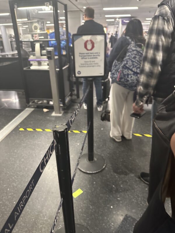 a group of people standing in a line