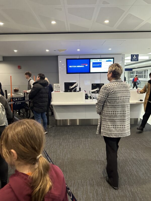 a group of people in an airport