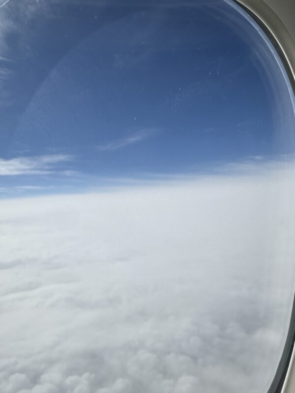 a view of clouds from an airplane window