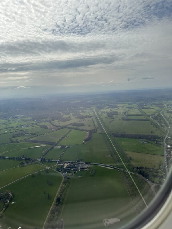 an aerial view of a green landscape