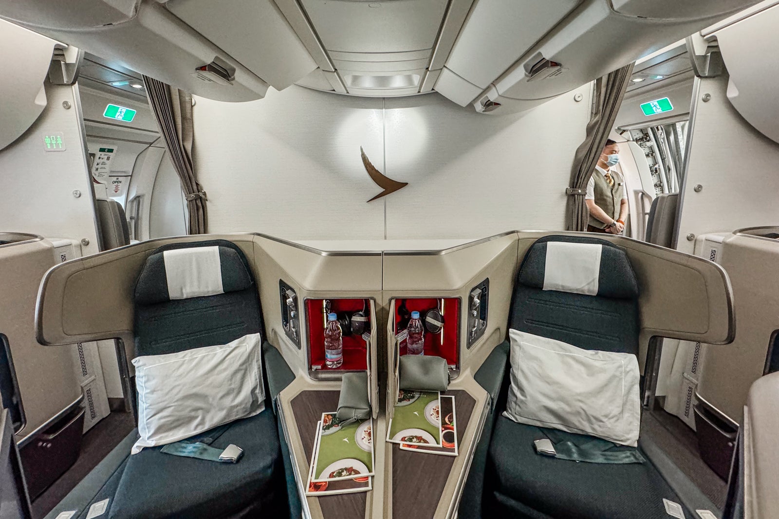 20240425 Cathay Pacific A350 1000 and 777 Business Cathay Pacific A350 1000 middle seats back ERosen - Travel News, Insights & Resources.