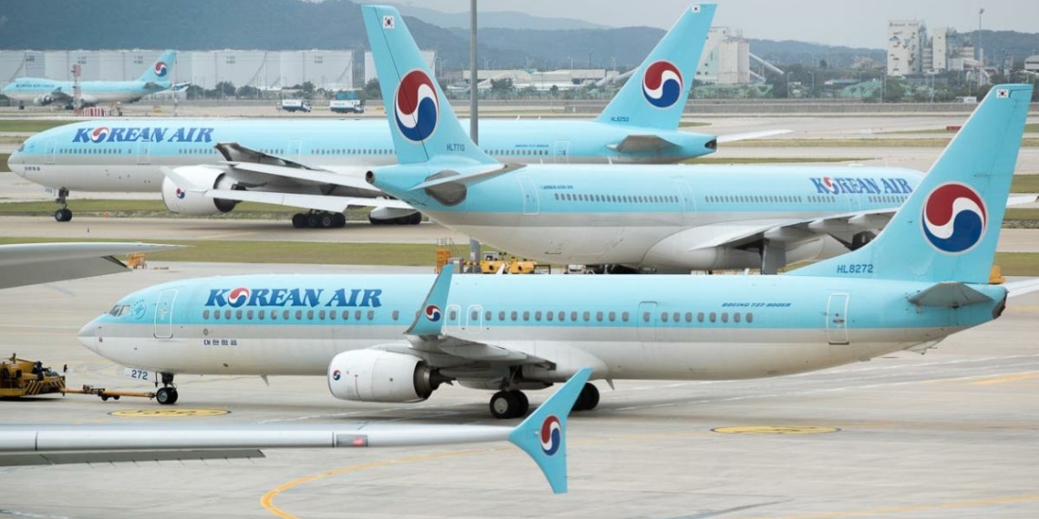 Boarding pass please Now stand on this scale Korean Air - Travel News, Insights & Resources.