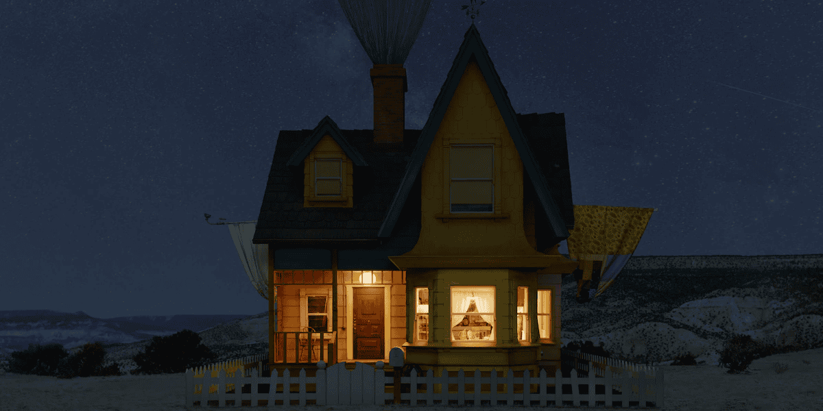 A whimsical house with a hot air balloon roof floats against a starry night sky, warmly lit windows revealing a cozy interior, surrounded by a picket fence in a serene landscape.